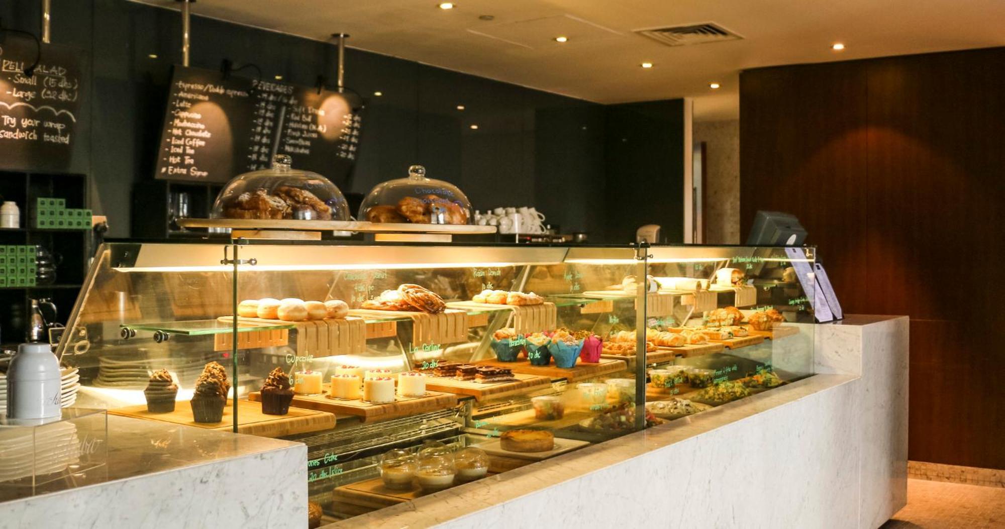 Intercontinental Residence Suites Dubai Festival City By Ihg Exterior foto A pastry display case